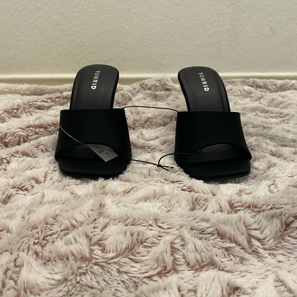 Torrid size 8 heels never worn before and the tag is still attached